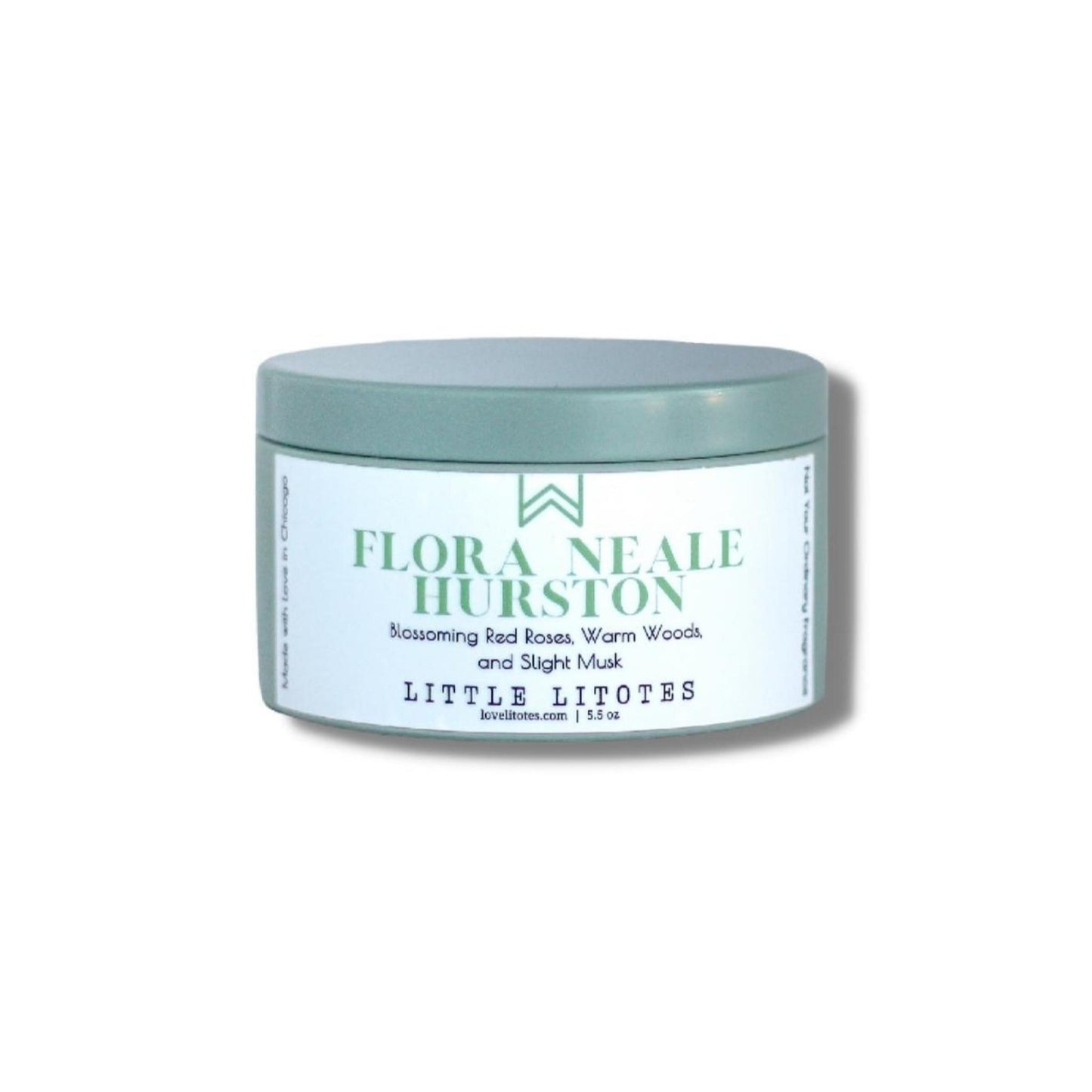 Travel-ready candle by Black-owned, woman-owned, Chicago-based Litotes. The candle sits on Their Eyes Were Watching God by Zora Neale Hurston. The candle has the lovely aroma of roses, woods, and slight musk. Flora Neale Hurston, celebrating author Zora Neale Hurston.