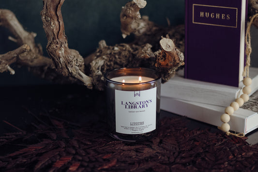 A luxury candle with the fragrance of leather and balsam, inspired by Langston Hughes.