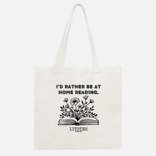 A tote showcasing a design for book-lovers that reads "I'd rather be at home reading."